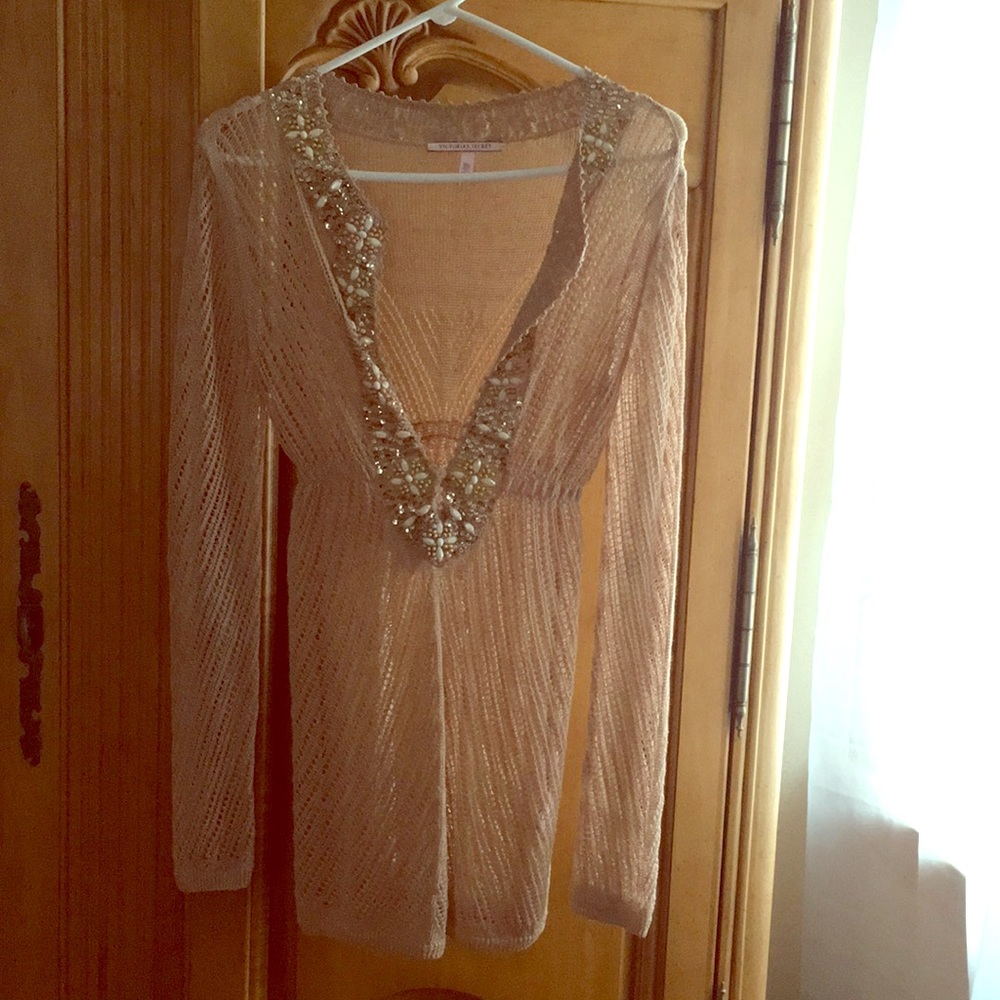 Beautiful knitted top or bathing suit coverup. New